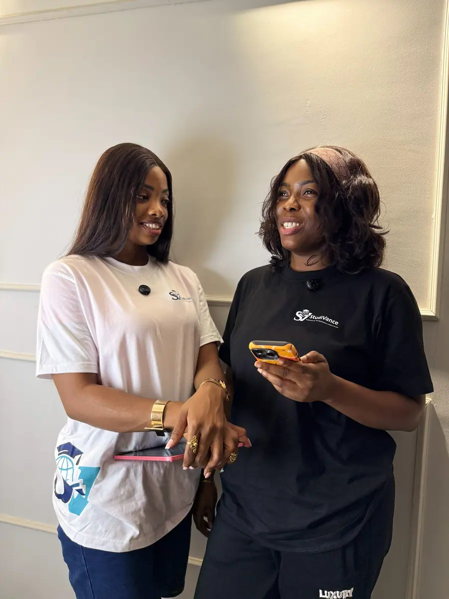 Studivance team members in branded shirts